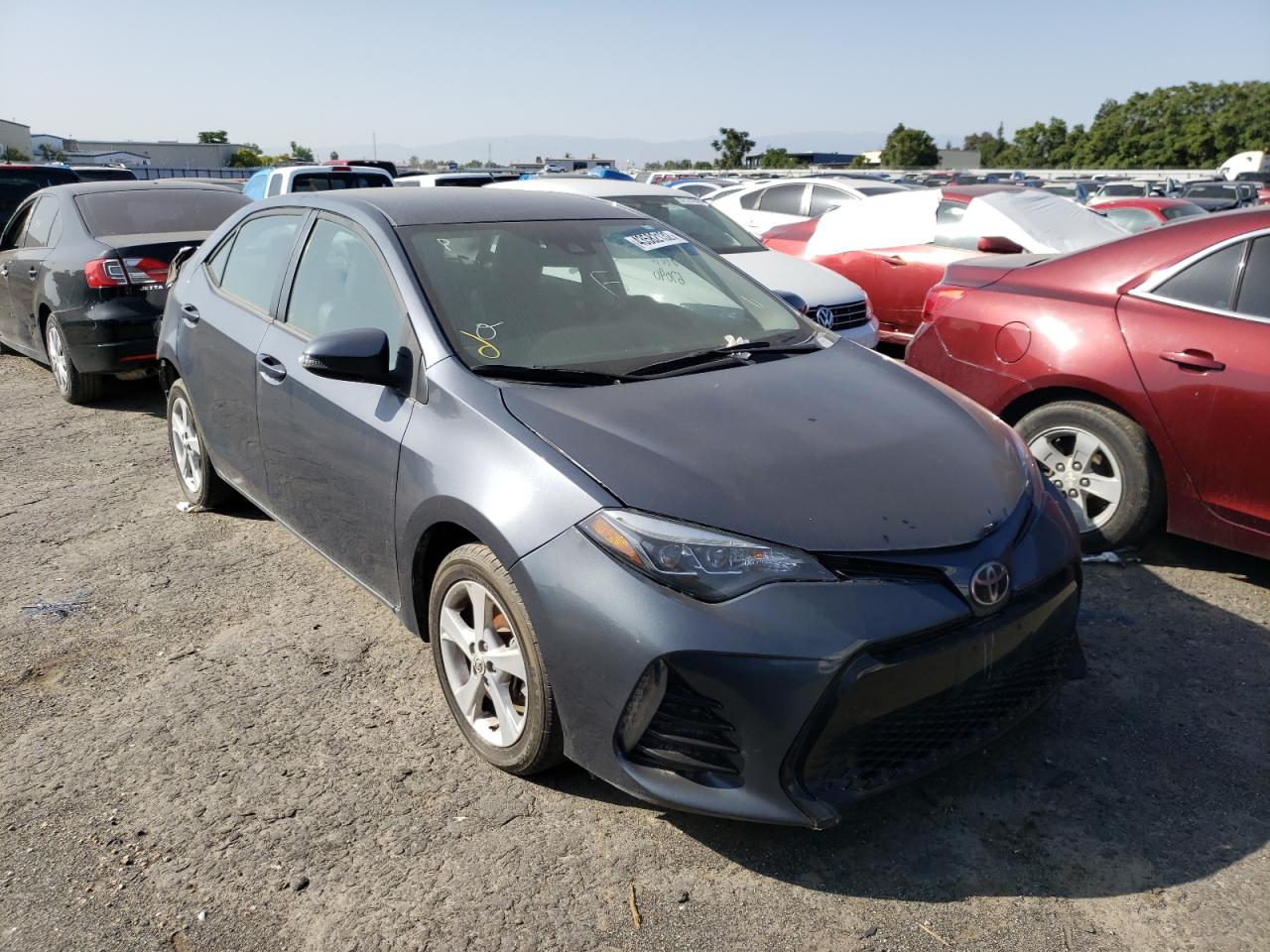 TOYOTA COROLLA L 2017 with VIN 5YFBURHE3HP612003 - Photo from auction