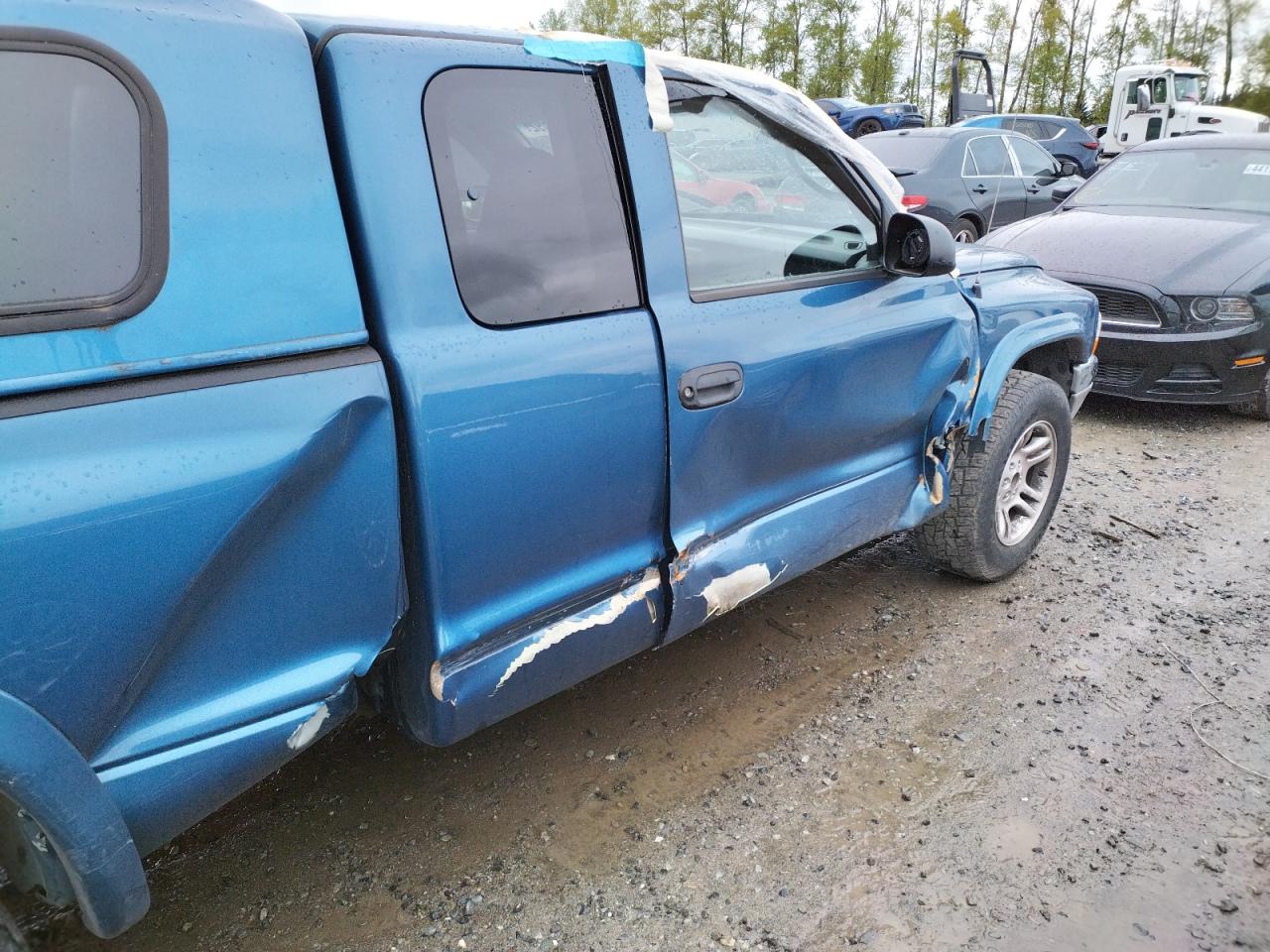 Photo 9 from auction – 2003 DODGE DAKOTA SLT with VIN 1D7HL42N03S195168