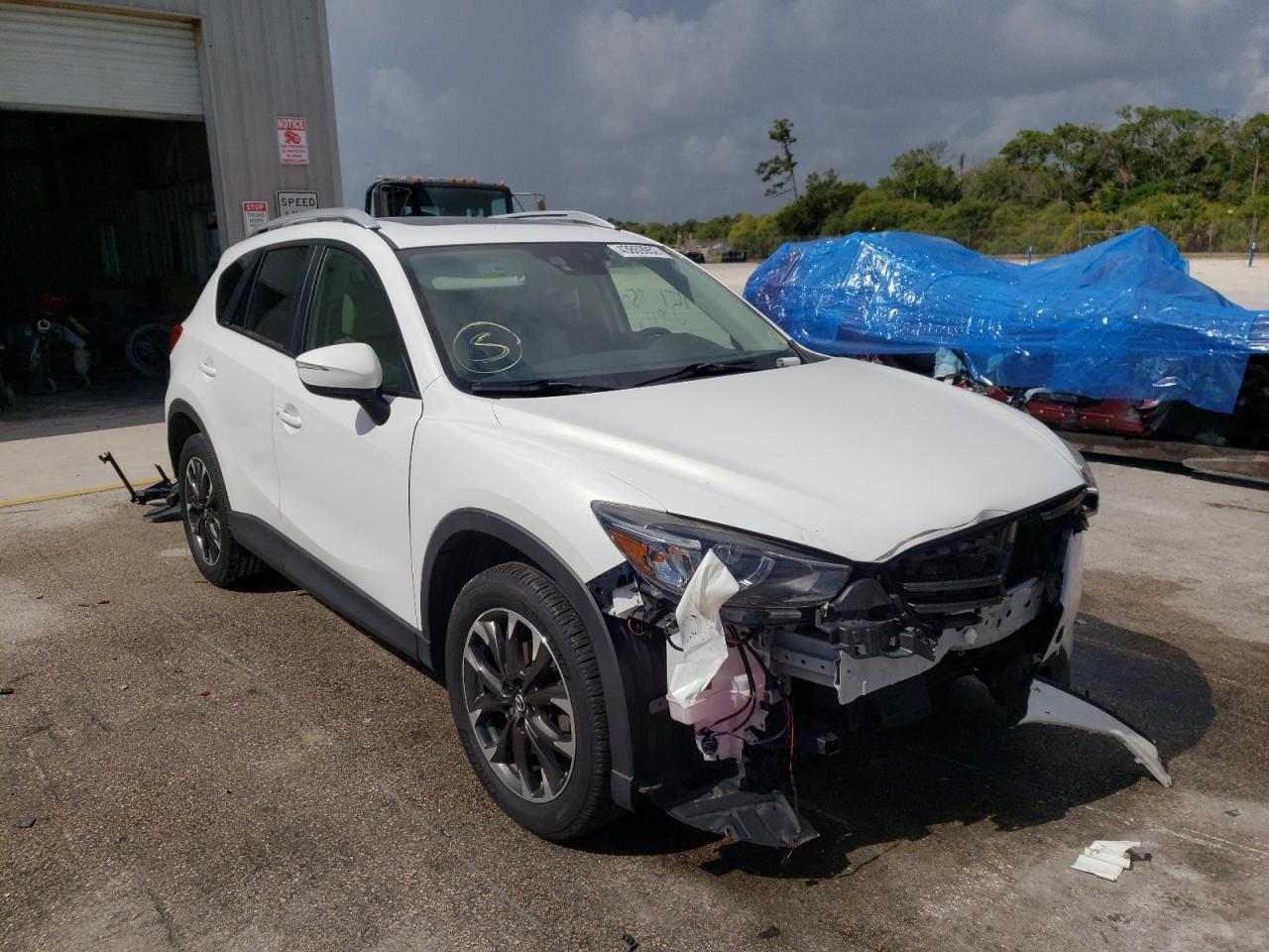 MAZDA CX-5 GT 2016 with VIN JM3KE2DY1G0857516 - Photo from auction