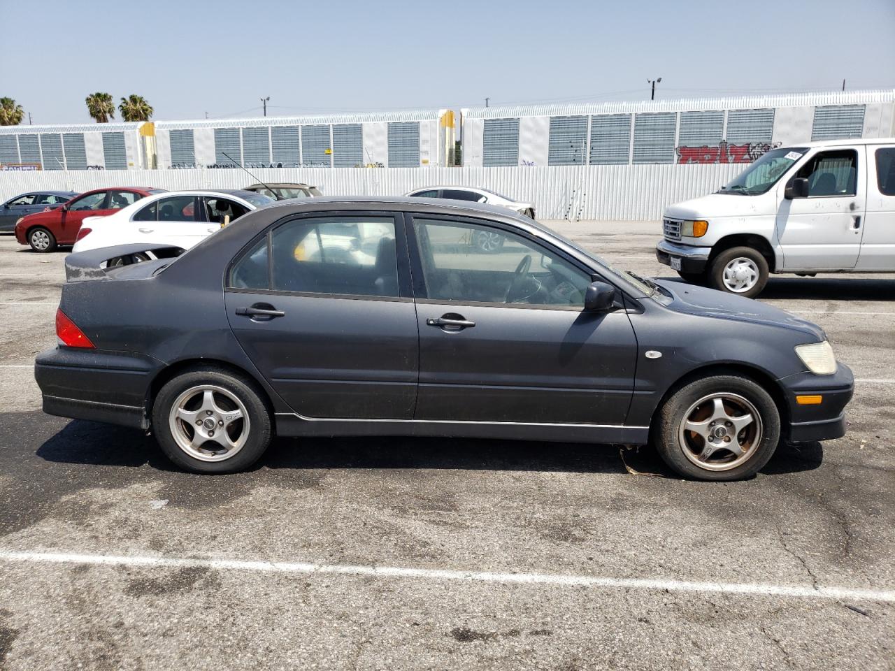 Photo 9 from auction – 2002 MITSUBISHI LANCER OZ with VIN JA3AJ86E12U065243