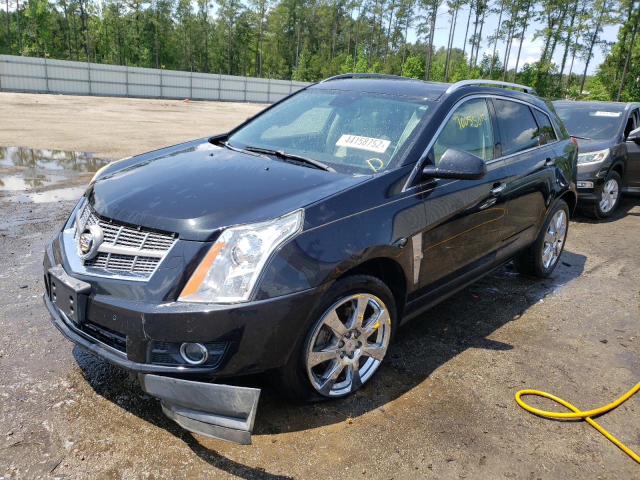 Photo 9 from auction – 2011 CADILLAC SRX PERFOR with VIN 3GYFNBEY0BS671664