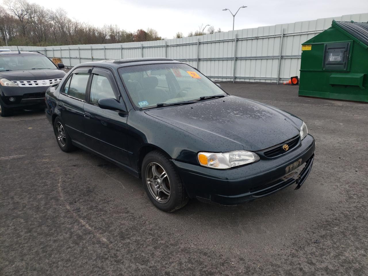 TOYOTA COROLLA VE 1999 with VIN 2T1BR18E1XC218047 - Photo from auction