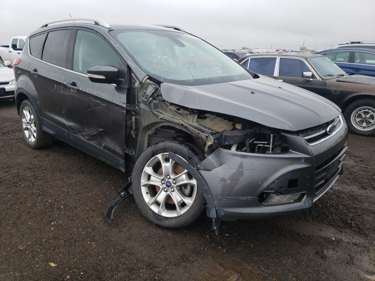 Photo 9 from auction – 2016 FORD ESCAPE TIT with VIN 1FMCU9J92GUC79372