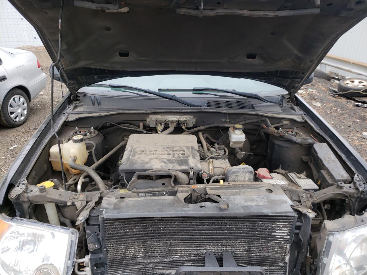 Photo 7 from auction – 2010 FORD ESCAPE LIM with VIN 1FMCU9EG7AKA86713