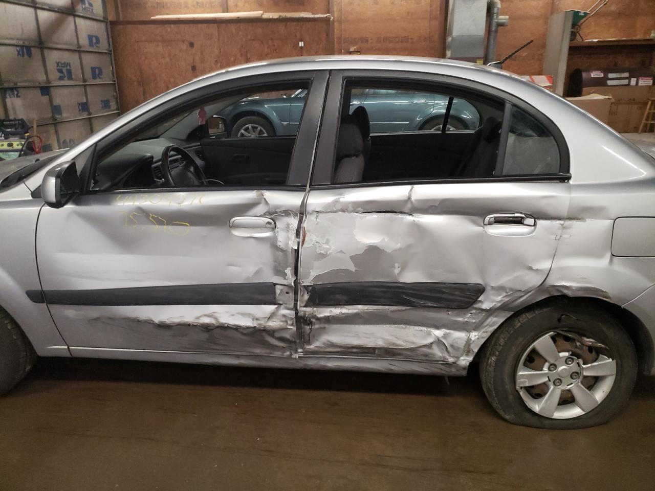 Photo 9 from auction – 2006 KIA RIO with VIN KNADE123866152501