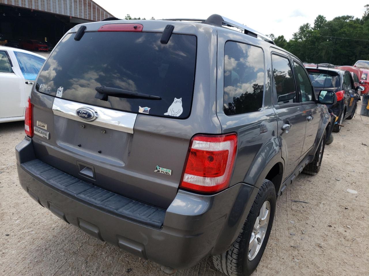 Photo 4 from auction – 2010 FORD ESCAPE LIM with VIN 1FMCU0EG4AKB77692