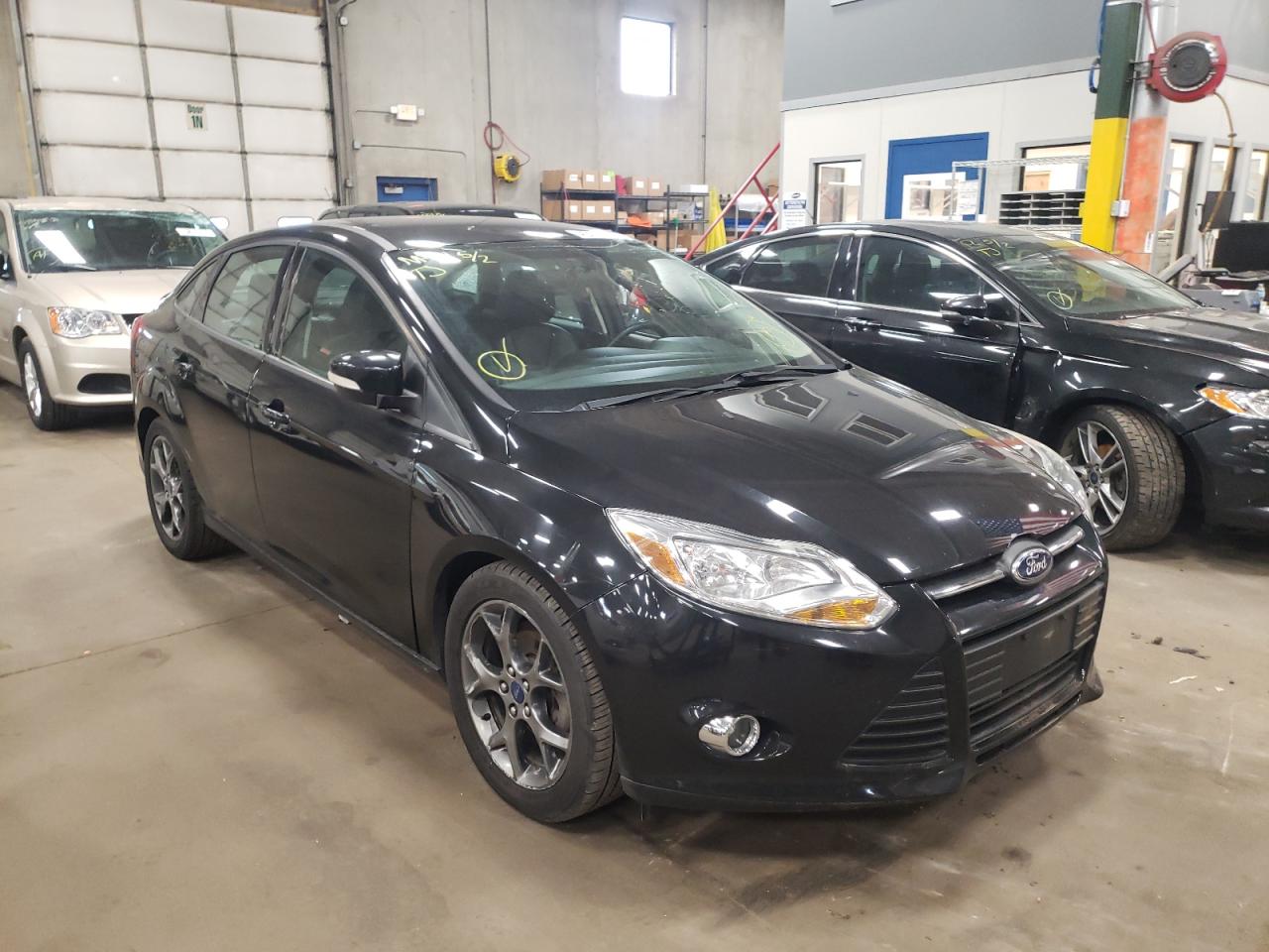 FORD FOCUS SE 2014 with VIN 1FADP3F28EL347689 - Photo from auction