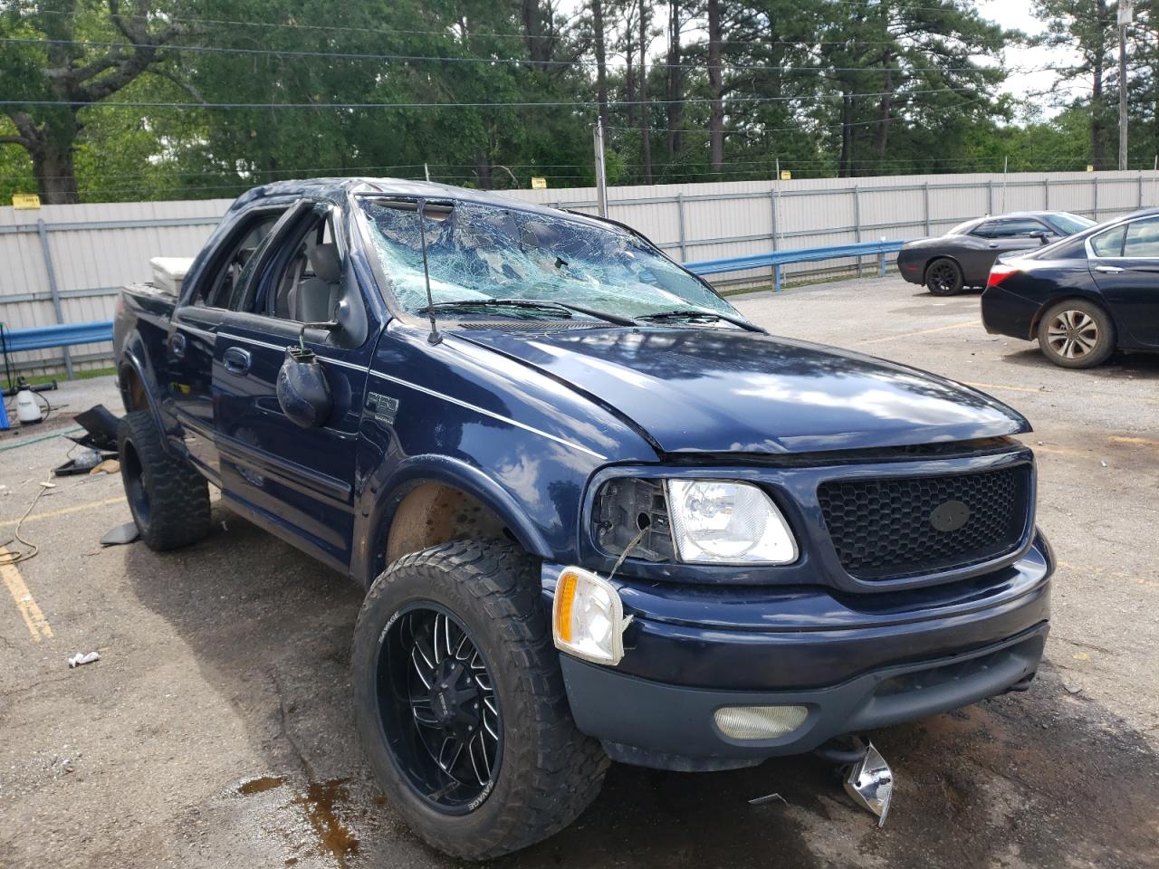 FORD F150 2003 with VIN 1FTRW08L73KC32110 - Photo from auction