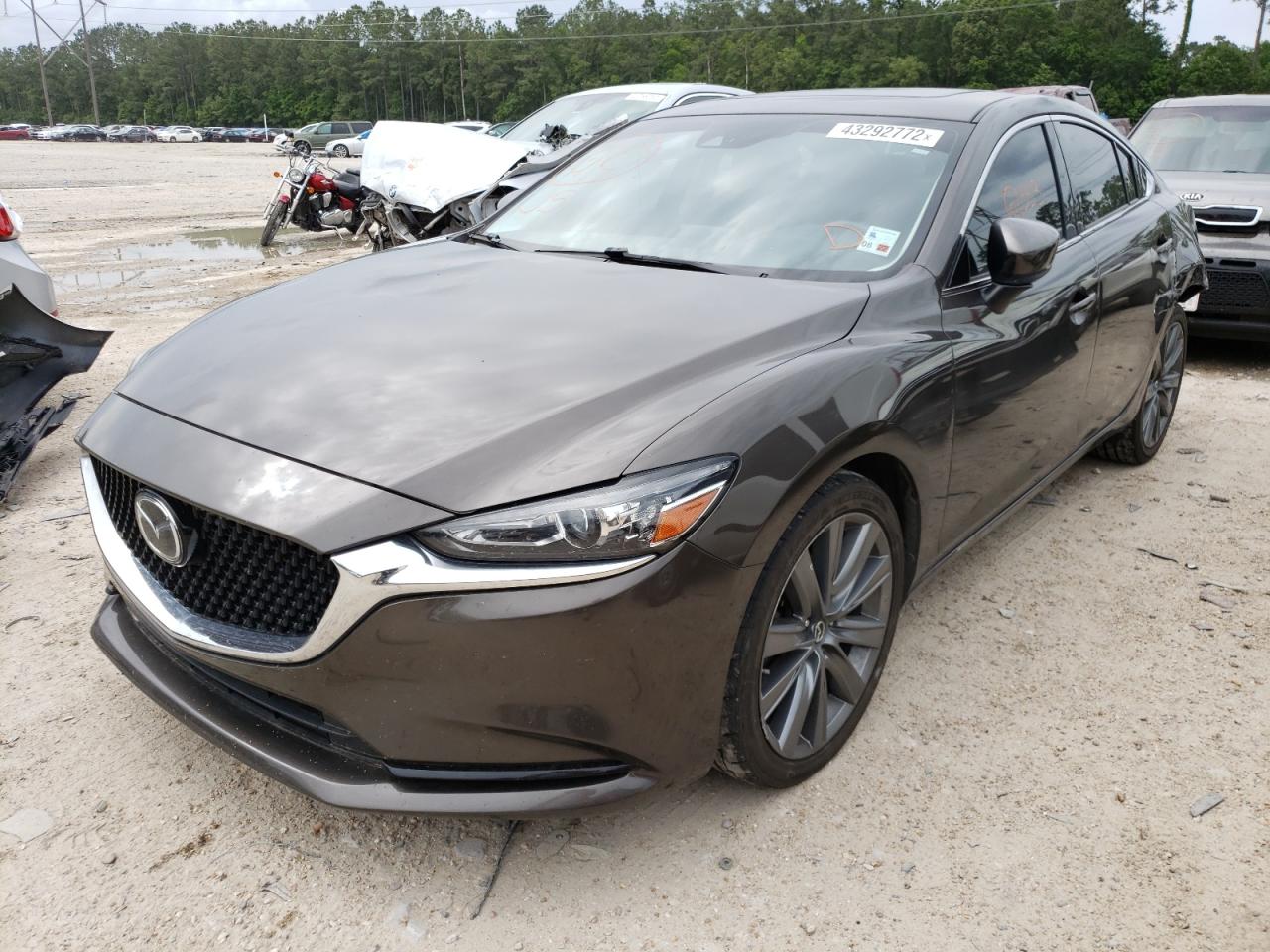 Photo 2 from auction – 2019 MAZDA 6 TOURING with VIN JM1GL1VMXK1500347