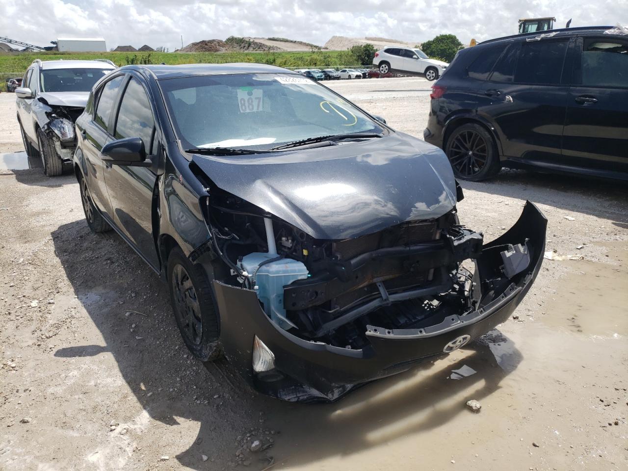 TOYOTA PRIUS C 2015 with VIN JTDKDTB36F1100497 - Photo from auction
