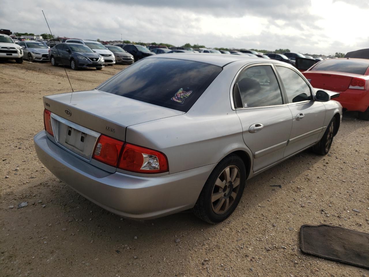 Photo 4 from auction – 2005 KIA OPTIMA LX with VIN KNAGD128955384623