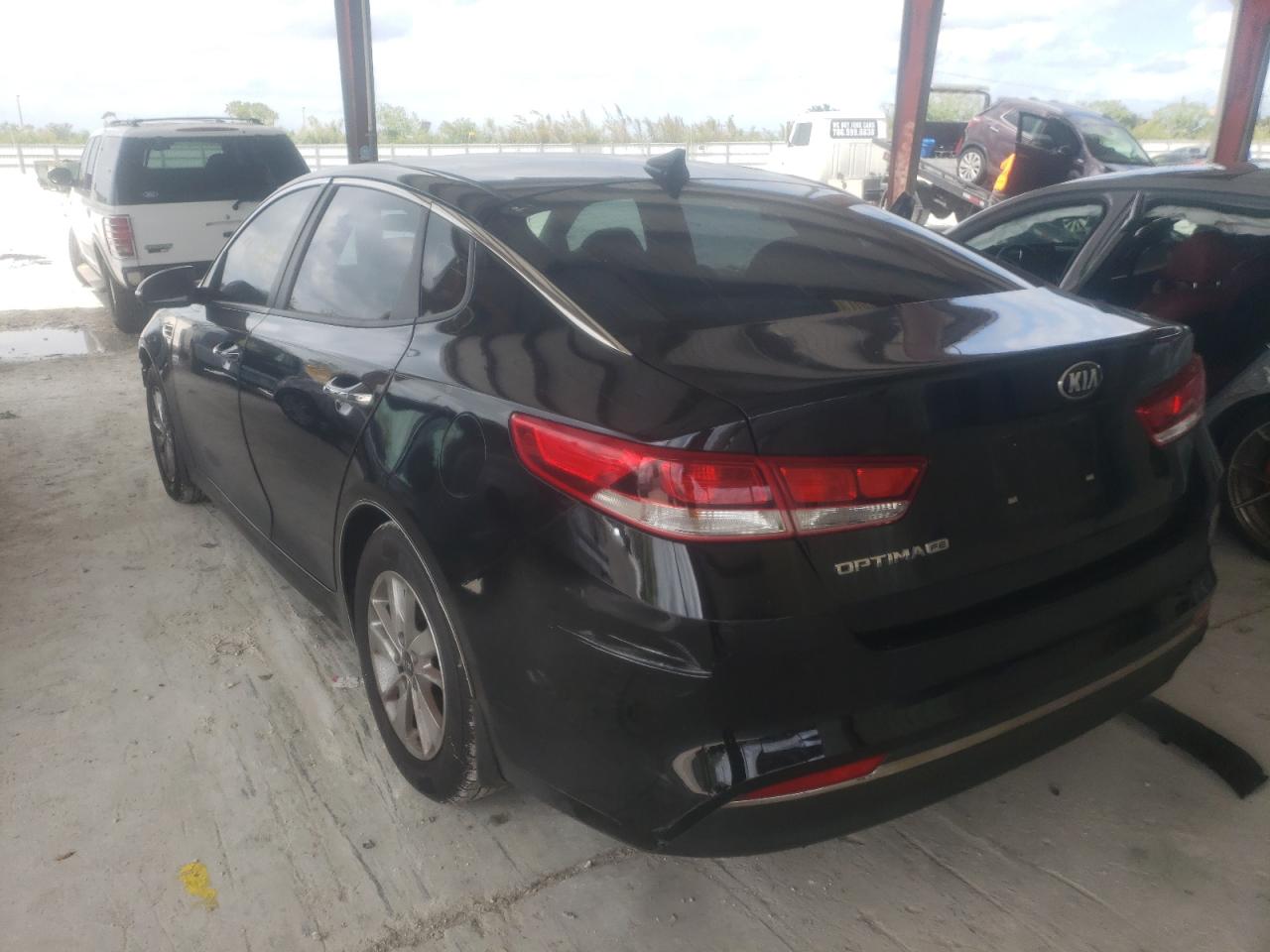 Photo 3 from auction – 2016 KIA OPTIMA LX with VIN 5XXGT4L33GG101481