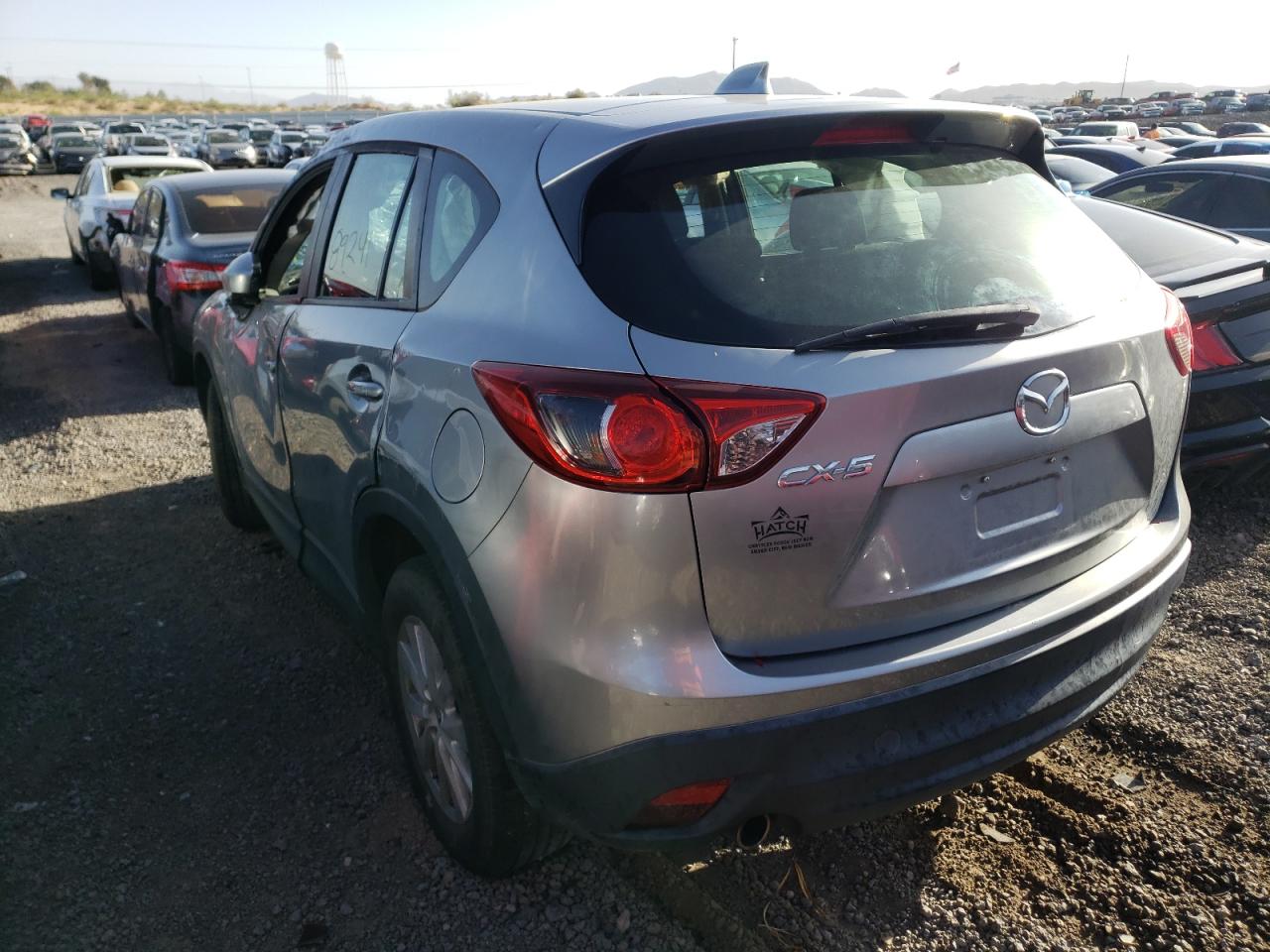 Photo 3 from auction – 2014 MAZDA CX-5 SPORT with VIN JM3KE2BE7E0328593