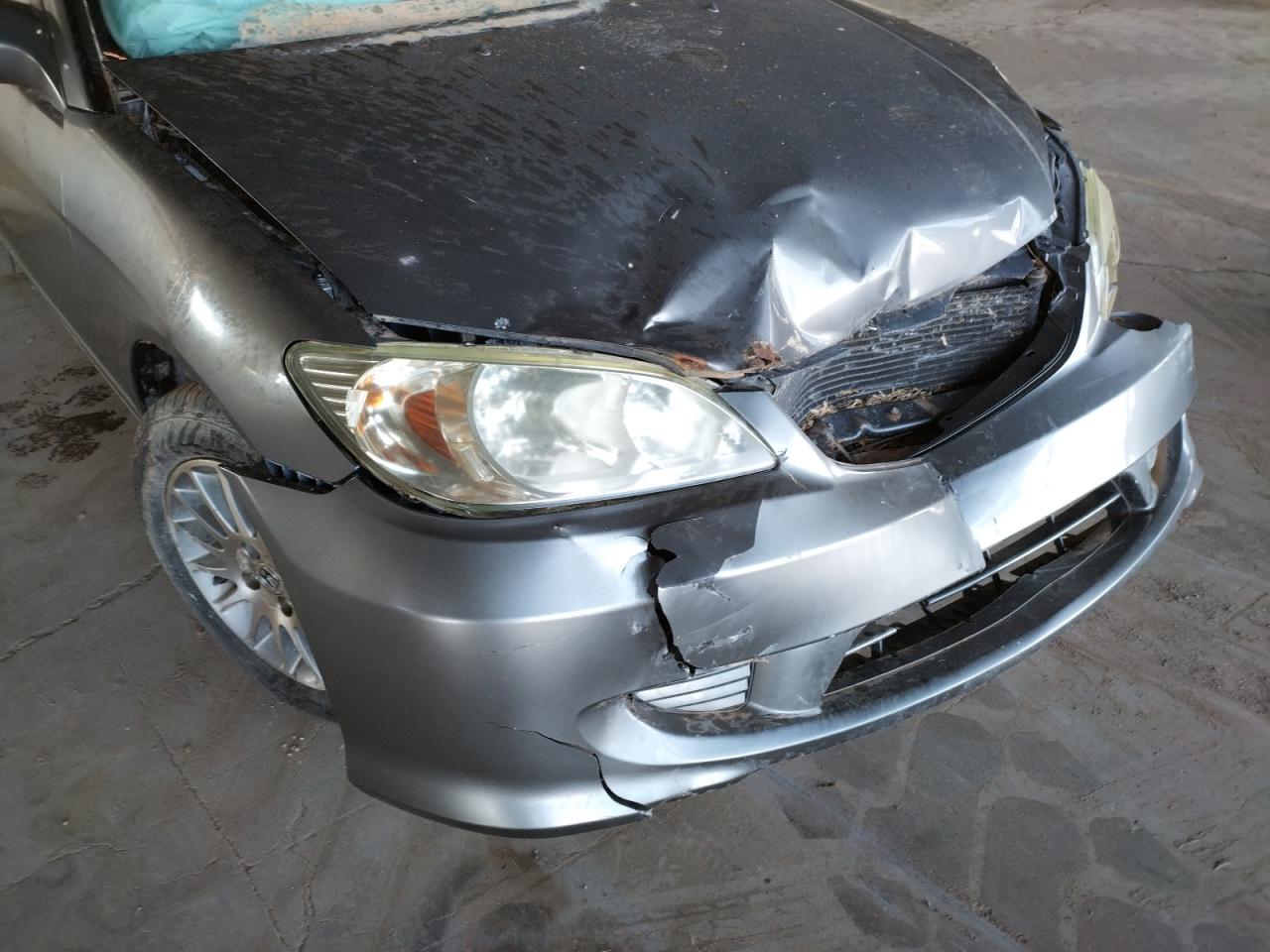 Photo 9 from auction – 2005 HONDA CIVIC EX with VIN 1HGEM21975L028064