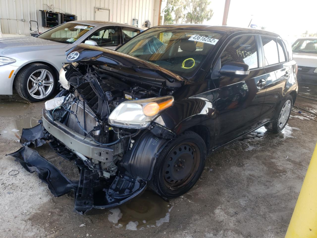 Photo 2 from auction – 2014 TOYOTA SCION XD with VIN JTKKUPB49E1046216