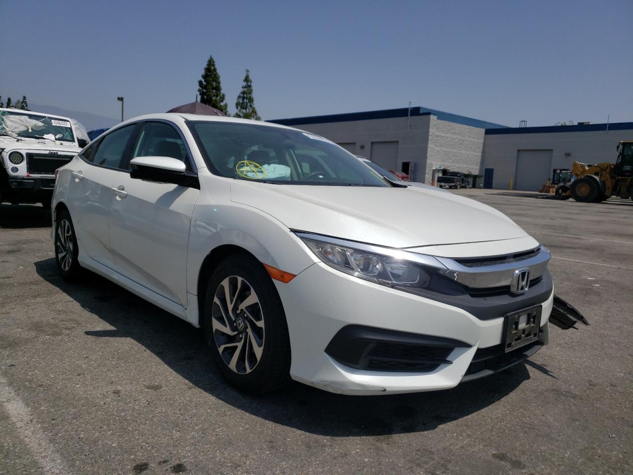 HONDA CIVIC EX 2017 with VIN 2HGFC2F72HH543389 - Photo from auction