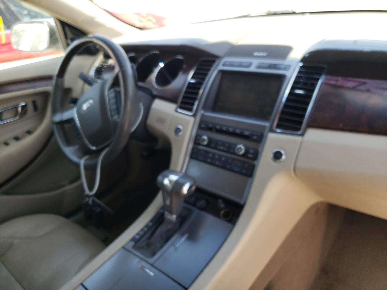 Photo 9 from auction – 2011 FORD TAURUS with VIN 1FAHP2FW4BG108692