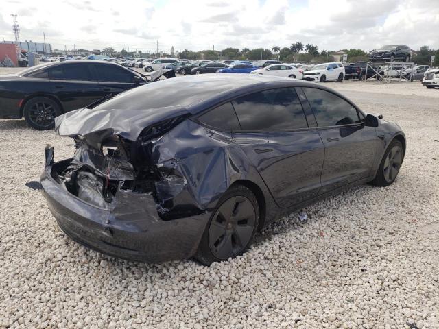 Photo 4 from auction – 2021 TESLA MODEL 3 with VIN 5YJ3E1EB4MF036375