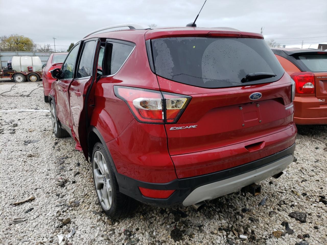 Photo 3 from auction – 2017 FORD ESCAPE TIT with VIN 1FMCU9J95HUA14723