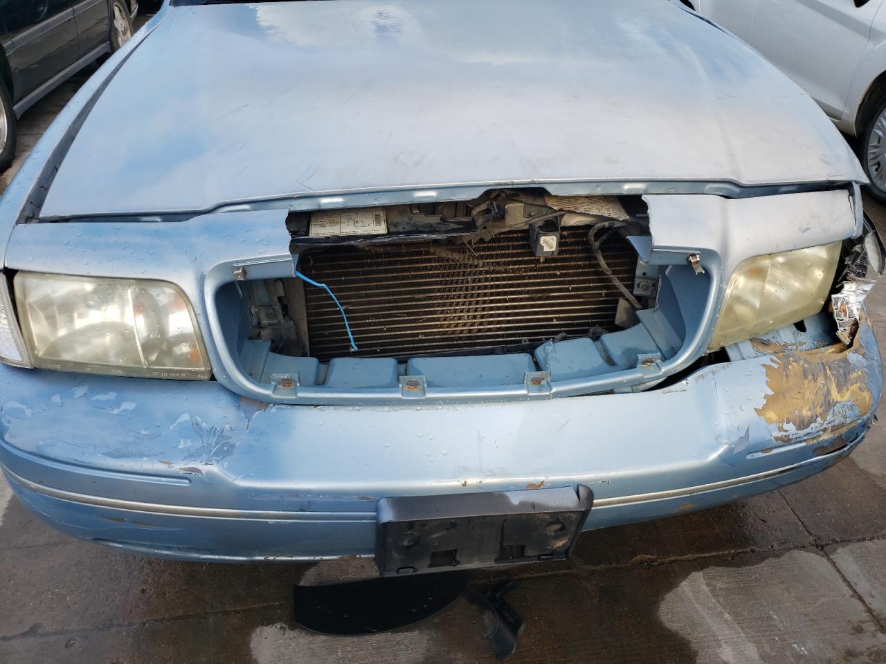 Photo 9 from auction – 1999 FORD CROWN VICT with VIN 2FAFP74W1XX229799