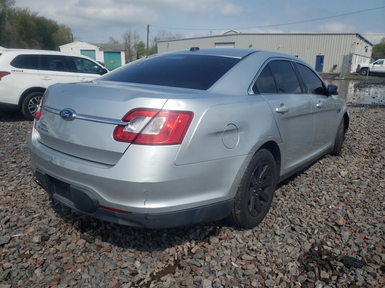 Photo 4 from auction – 2011 FORD TAURUS SE with VIN 1FAHP2DW4BG127570