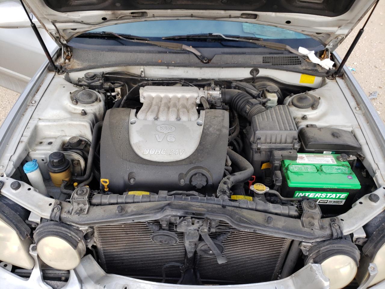 Photo 7 from auction – 2005 KIA OPTIMA LX with VIN KNAGD128955384623