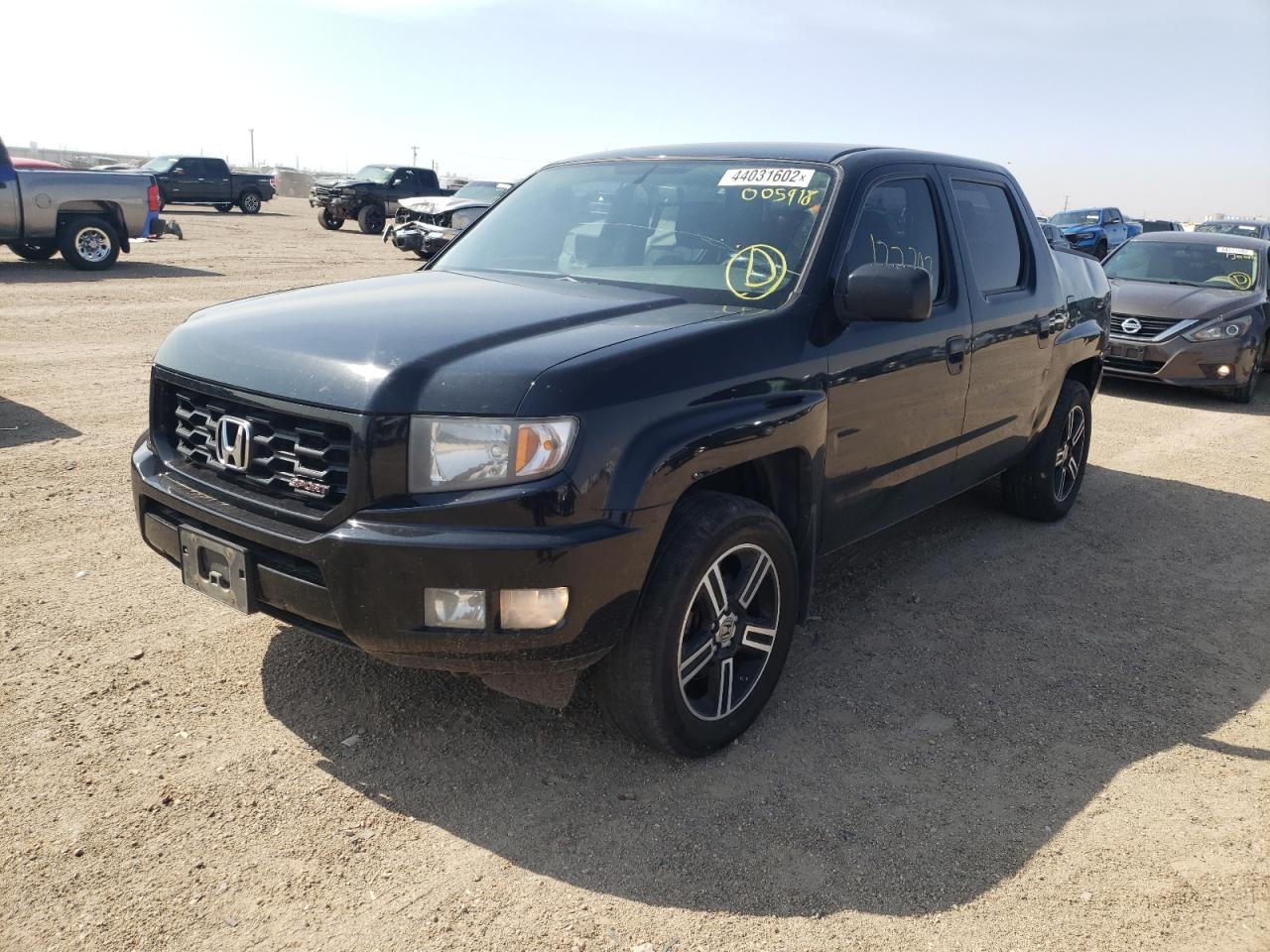 Photo 2 from auction – 2013 HONDA RIDGELINE with VIN 5FPYK1F74DB005918