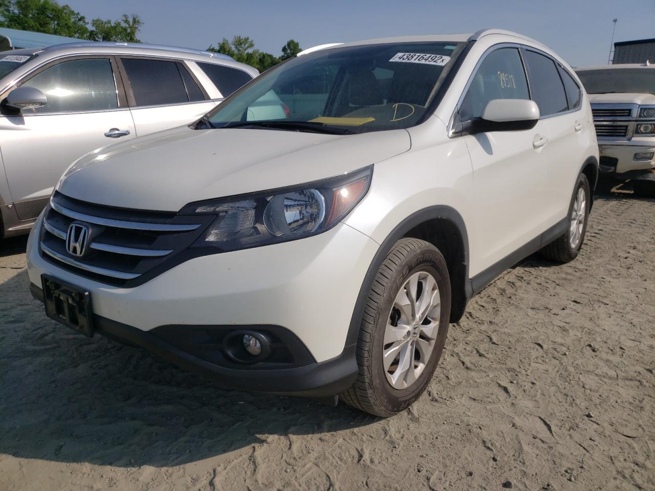 Photo 2 from auction – 2014 HONDA CR-V EXL with VIN 5J6RM3H79EL035313