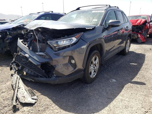 Photo 2 from auction – 2019 TOYOTA RAV4 XLE with VIN JTMW1RFVXKD009069