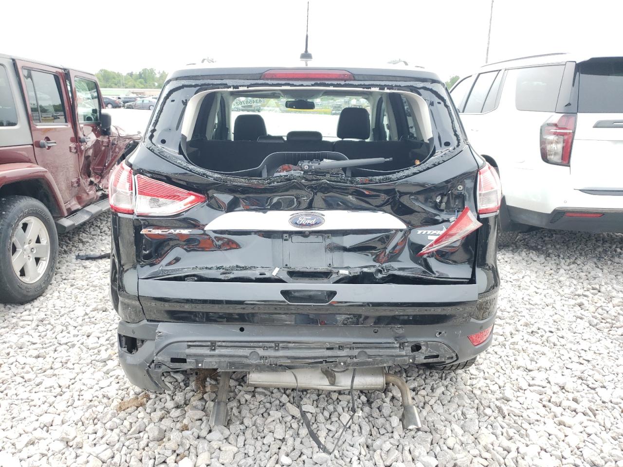 Photo 9 from auction – 2014 FORD ESCAPE TIT with VIN 1FMCU9J93EUD49524