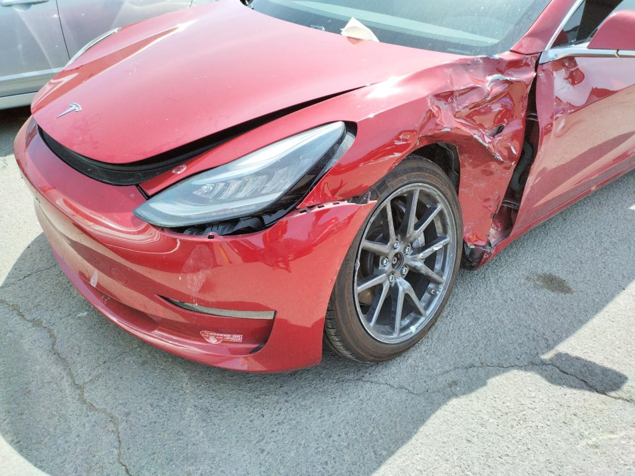 Photo 9 from auction – 2018 TESLA MODEL 3 with VIN 5YJ3E1EB2JF085103