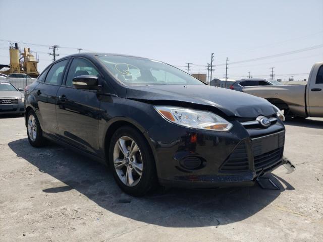 FORD FOCUS SE 2014 con VIN 1FADP3F20EL116849 - Foto de la subasta