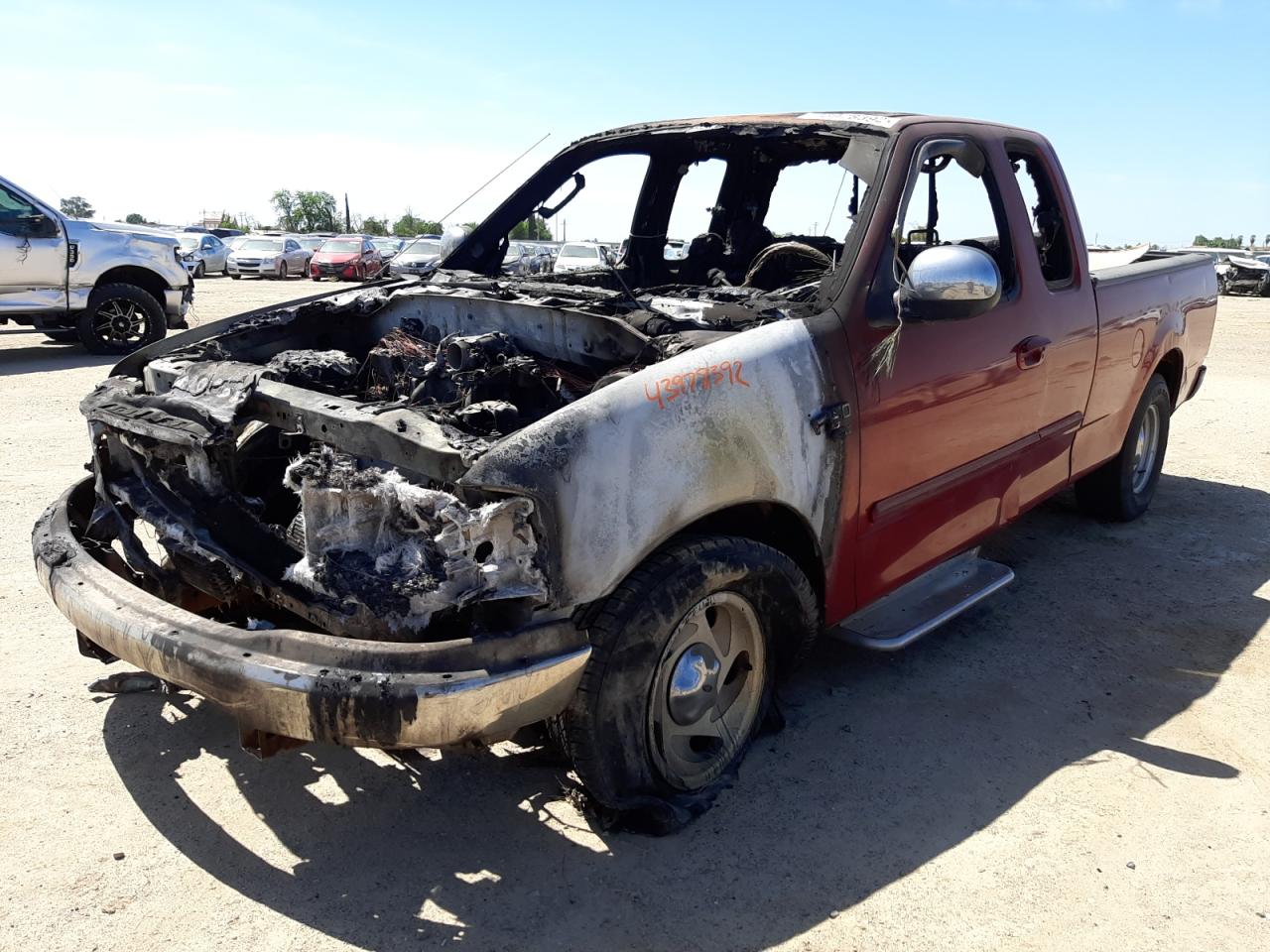 Photo 2 from auction – 2002 FORD F150 with VIN 1FTRX17W52NB60626