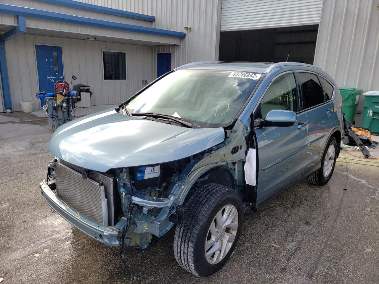 Photo 2 from auction – 2016 HONDA CR-V EXL with VIN 2HKRM3H70GH530612