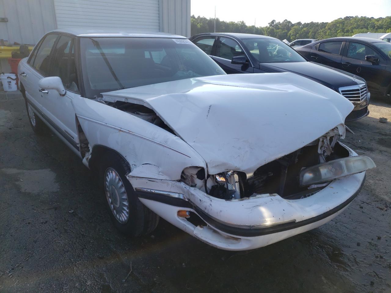 BUICK LESABRE CU 1997 with VIN 1G4HP52K2VH582231 - Photo from auction
