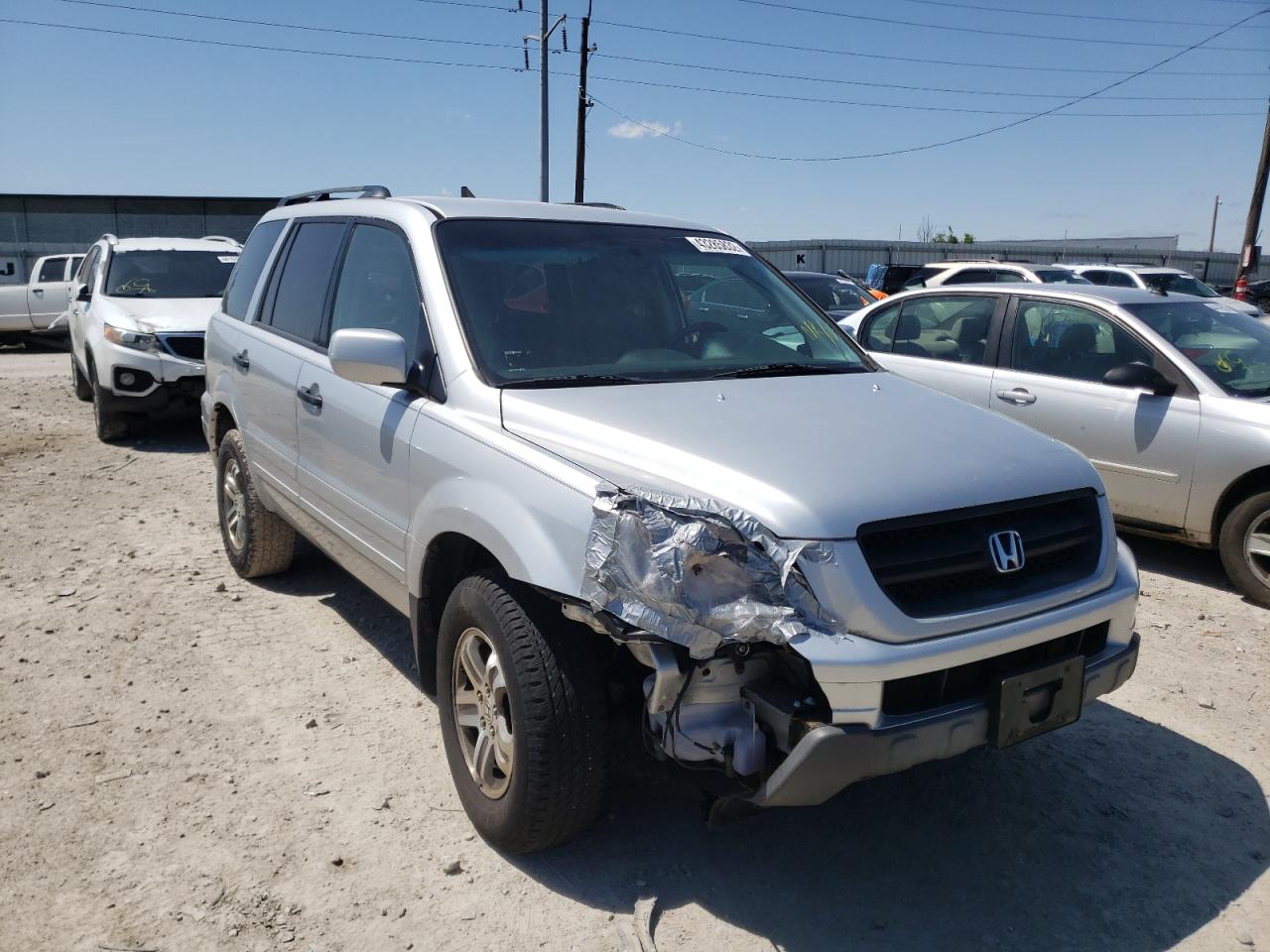 Photo 9 from auction – 2004 HONDA PILOT EX with VIN 2HKYF18434H530017