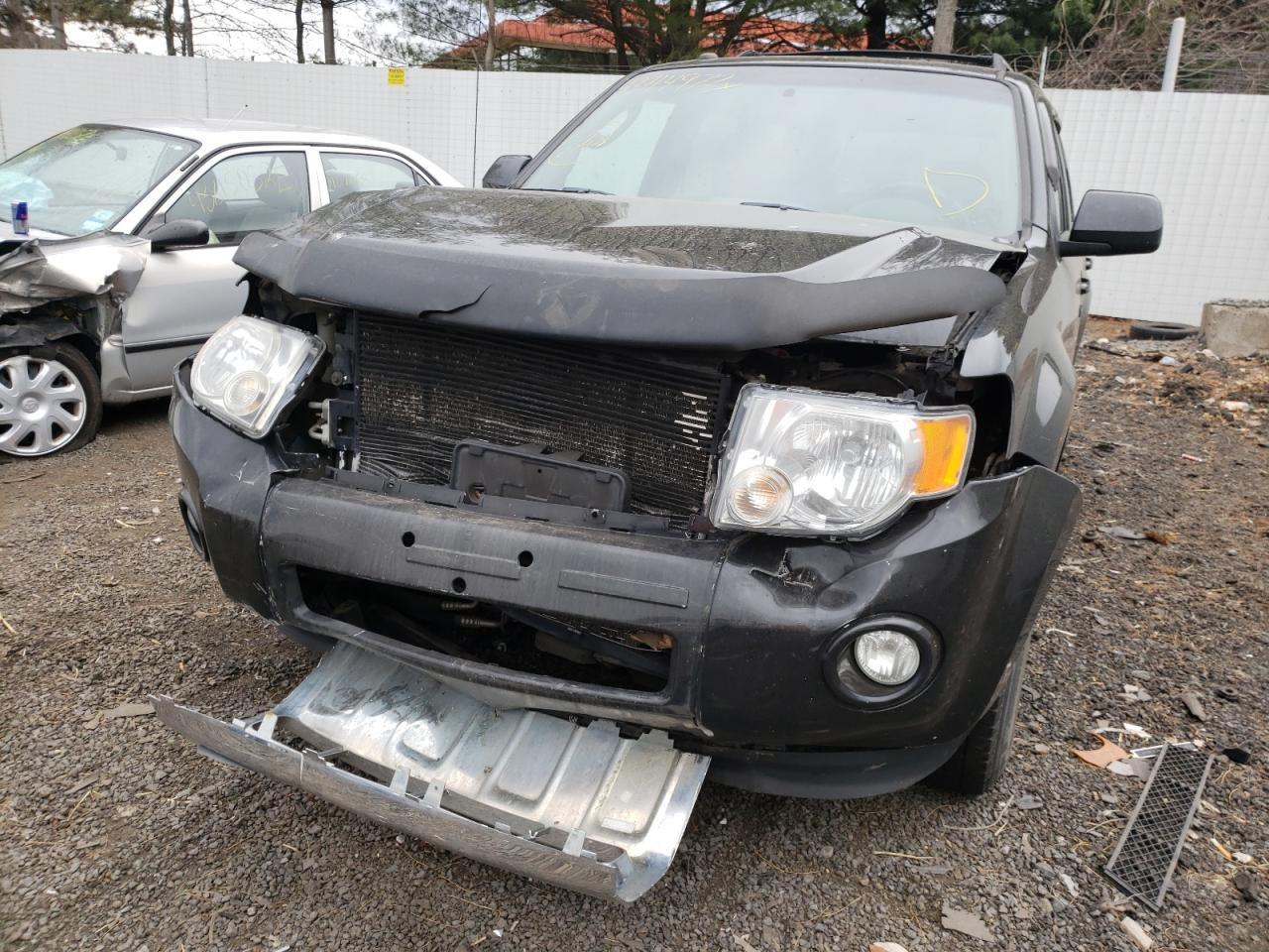 Photo 9 from auction – 2010 FORD ESCAPE LIM with VIN 1FMCU9EG7AKA86713