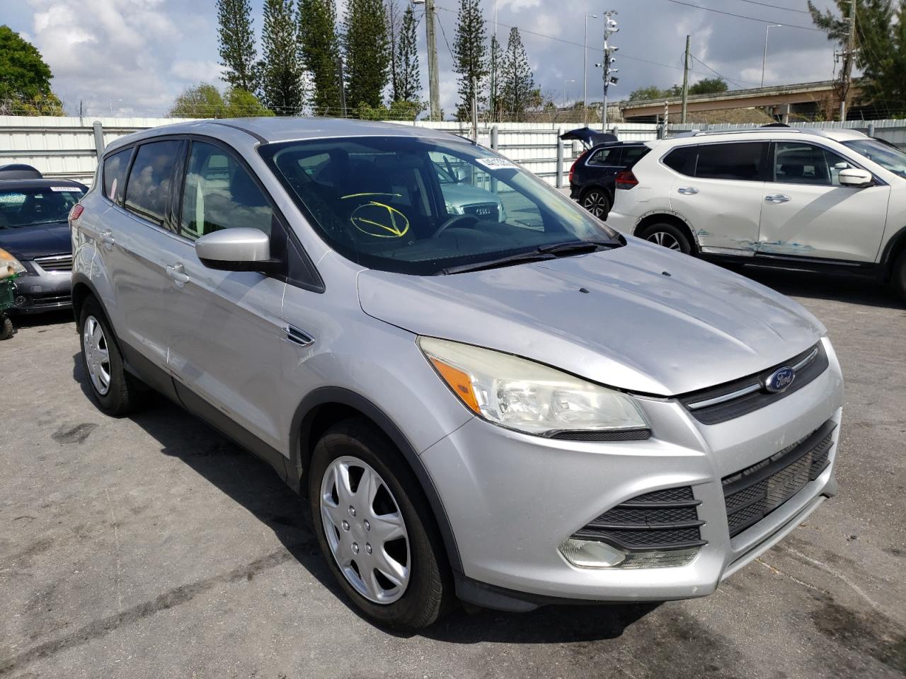 FORD ESCAPE SE 2014 with VIN 1FMCU0GX0EUE25427 - Photo from auction