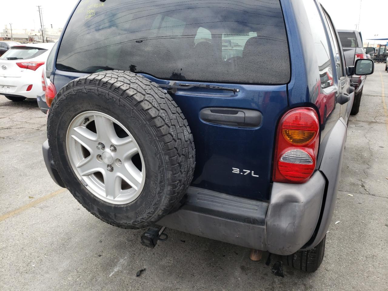 Photo 9 from auction – 2003 JEEP LIBERTY SP with VIN 1J4GL48K23W734668