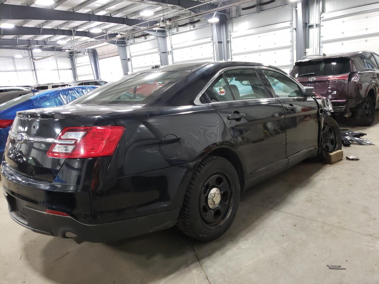Photo 4 from auction – 2013 FORD TAURUS POL with VIN 1FAHP2M8XDG157760