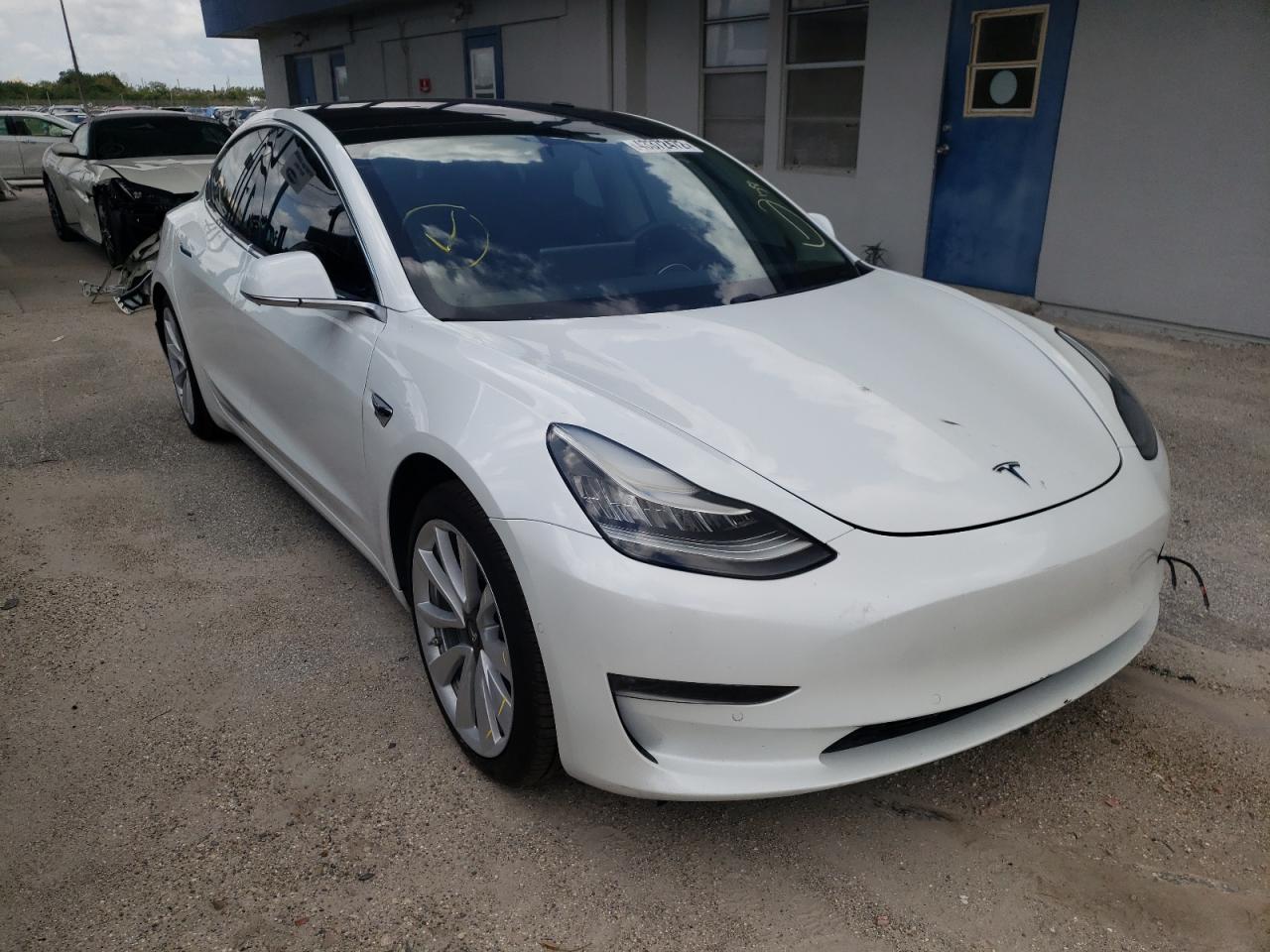 TESLA MODEL 3 2018 with VIN 5YJ3E1EA0JF039101 - Photo from auction