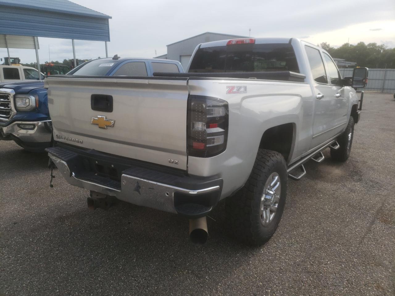 Photo 4 from auction – 2015 CHEVROLET SILVERADO with VIN 1GC1KWE86FF533704