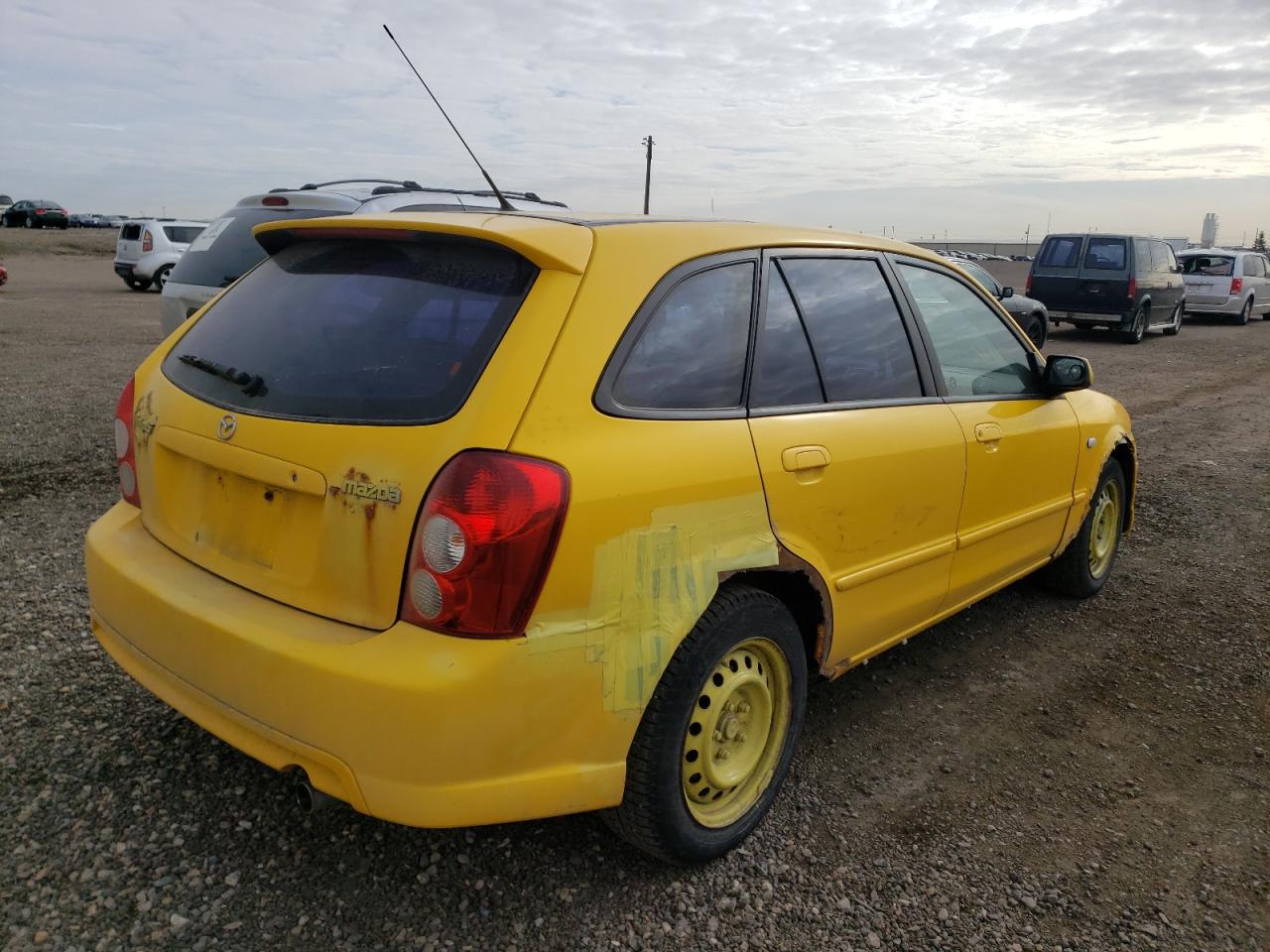 Photo 4 from auction – 2003 MAZDA PROTEGE PR with VIN JM1BJ245731141413