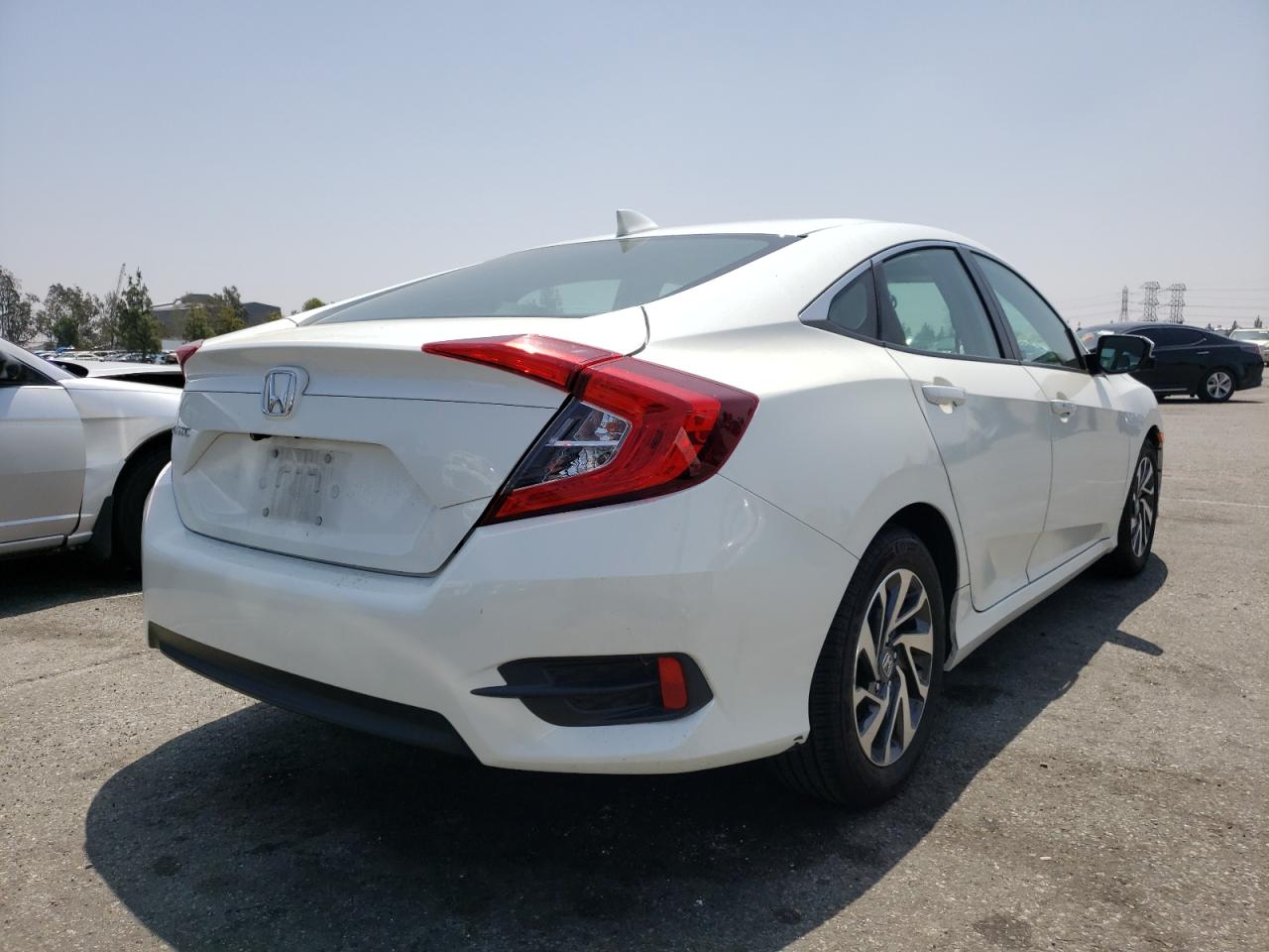 Photo 4 from auction – 2017 HONDA CIVIC EX with VIN 2HGFC2F72HH543389