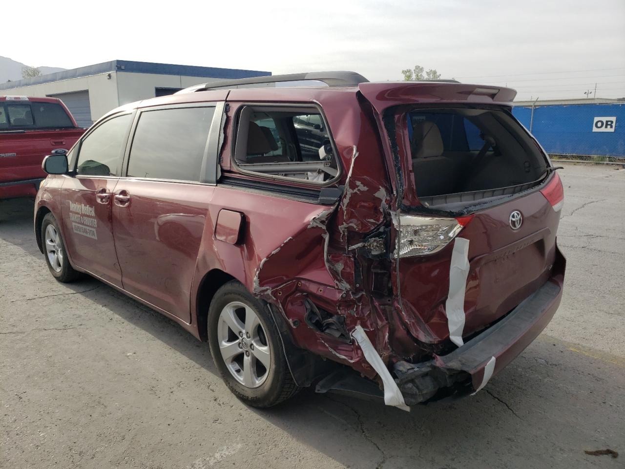 Photo 3 from auction – 2014 TOYOTA SIENNA LE with VIN 5TDKK3DC9ES449125