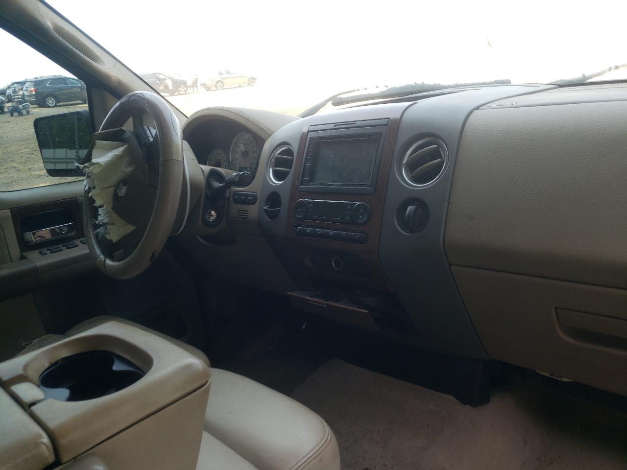Photo 9 from auction – 2004 FORD F150 SUPER with VIN 1FTPW12574KC93207