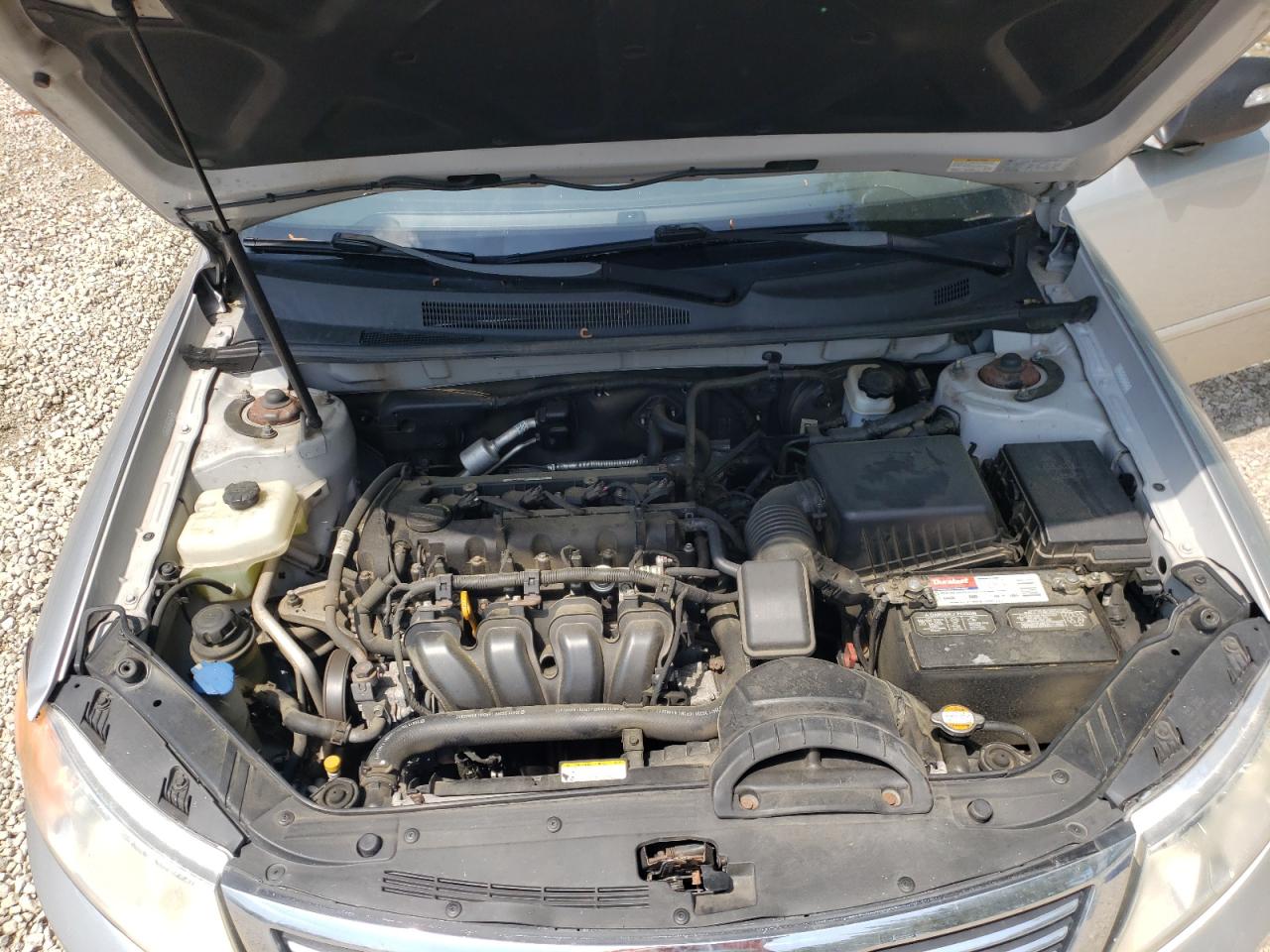 Photo 7 from auction – 2009 KIA OPTIMA LX with VIN KNAGE228595302704