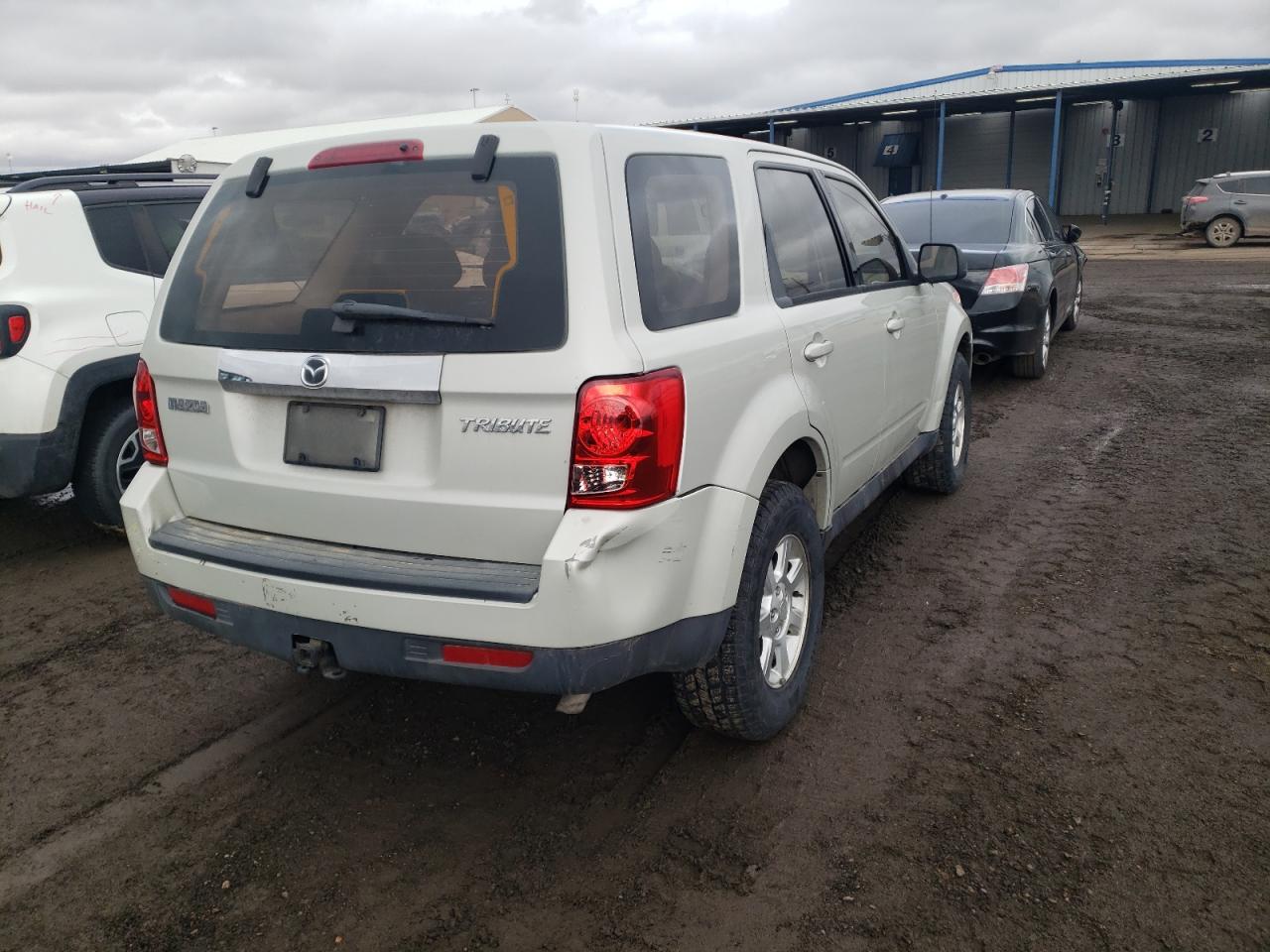 Photo 4 from auction – 2009 MAZDA TRIBUTE I with VIN 4F2CZ02709KM03149