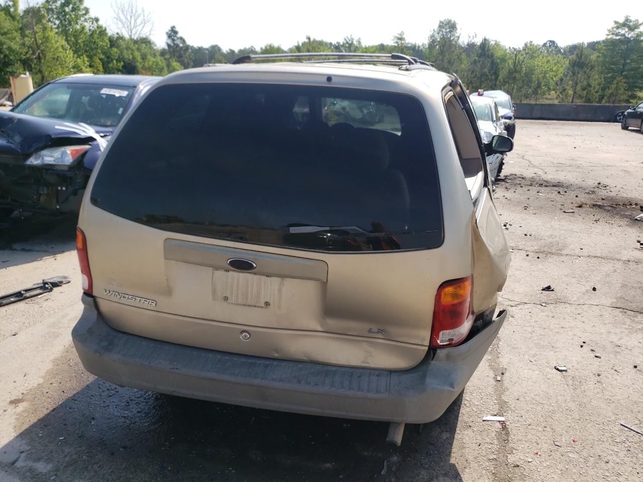 Photo 9 from auction – 1999 FORD WINDSTAR L with VIN 2FMZA5142XBB77690