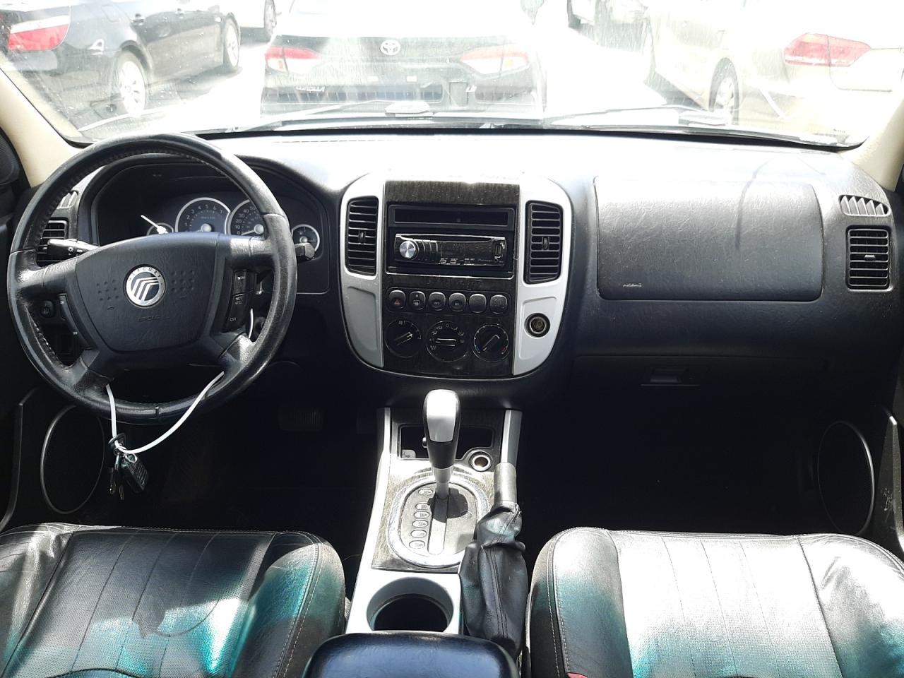 Photo 9 from auction – 2005 MERCURY MARINER with VIN 4M2CU57145DJ22738